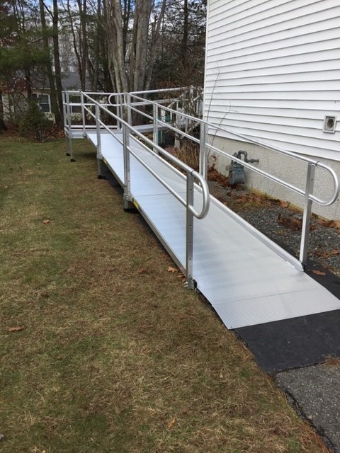 wheelchair-ramp-built-around-corner-of-home-to-backyard-in-Massachusetts.jpg