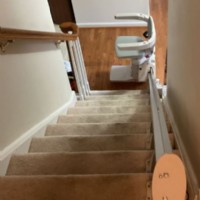 Bruno-Elan-stairlift-at-bottom-of-staircase-in-Baltimore-home.JPG