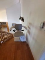 Bruno Elan stairlift in swivel position at top landing in Los Angeles home