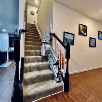 Bruno-Elan-stairlift-with-power-folding-rail-and-components-folded-up-installed-in-OH-basement-stairs-by-Lifeway-Mobility.JPG