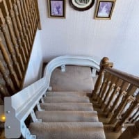 Bruno-custom-curved-stairlift-rail-in-Naperville-IL-installed-by-Lifeway-Mobility.JPG