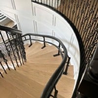 Hamar-Helix-curved-stairlift-special-bend-black-rail-professionally-installed-by-Lifeway-Mobility.JPG
