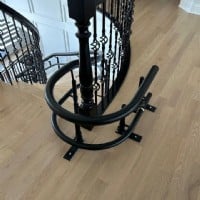 Harmar-Helix-curved-stairlift-with-black-painted-rail-Naperville-IL.JPG