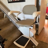 Harmar SL 300 stairlift at bottom of stairs installed by Lifeway Mobility