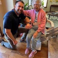 Lifeway Mobility Wichita installer with happy stair lift customer 