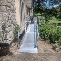 Lifeway-Mobility-technician-finishes-installation-of-wheelchair-ramp-in-Kansas-City.JPG