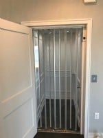 clear-accordion-doors-on-residential-elevator-installed-in-LA-by-Lifeway-Mobility.JPG