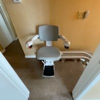 curved-stairlift-San-Diego-at-top-landing-of-stairs.JPG
