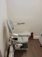 curved-stairlift-at-bottom-landing-of-staircase-installed-by-Lifeway-Mobility-Philadelphia.jpg