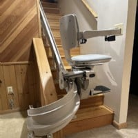 curved-stairlift-installed-by-Lifeway-Mobility-on-basement-stairs-with-180-degree-park-position-at-bottom.JPG