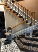 custom-curved-stairlift-on-cheetah-print-stairlift-in-Hollywood-CA-home.JPG