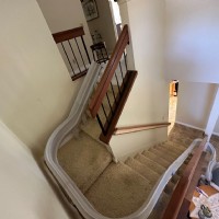 custom-curved-stairlift-with-180-degree-park-at-bottom-landing-from-Lifeway-Mobiliy-San-Diego.jpg