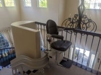 custom-curved-stairlift-with-black-upholstery-installed-by-Lifeway-Mobility-in-Redwood-City-California.JPG