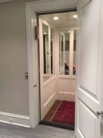 home-elevator-in-Chicago-with-half-wall-mirror-cab-interior.jpg