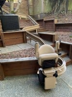 outdoor-Bruno-curved-stairlift-in-San-Francisco-with-components-folded-up.JPG