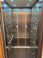 residential elevator with custom cab walls in Newport Beach California