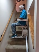 senior-man-riding-stairlift-installed-by-Lifeway-Mobility-Wichita.jpg