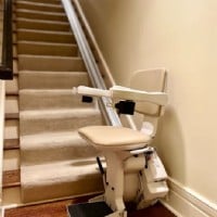 stairlift with cream upholstery installed in Ohio home by Lifeway Mobility Columbus