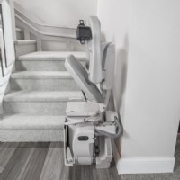 Bruno curved stairlift side view with seat folded