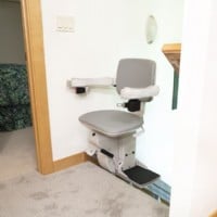 Bruno Elite stairlift with new chair at top landing of stairs swiveled 90 degrees