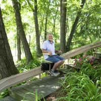 Bruno outdoor curved stairlift man riding on chair