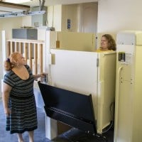 mom waits for daughter using Harmar Highlander VPL from Lifeway Mobility
