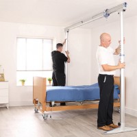 Lifeway Mobility technicians install overhead gantry system