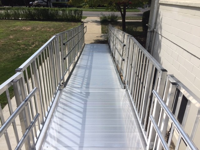 EZ-Access-aluminum-modular-ramp-with-solid-surface-and-handrails