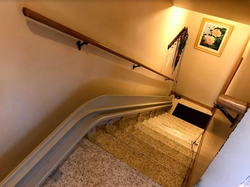 Bruno-curved-rail-mounted-on-staircase-in-home-in-Minnesota.JPG