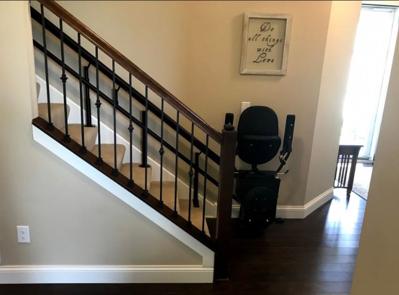 Harmar Helix stairlift at bottom landing of staircase