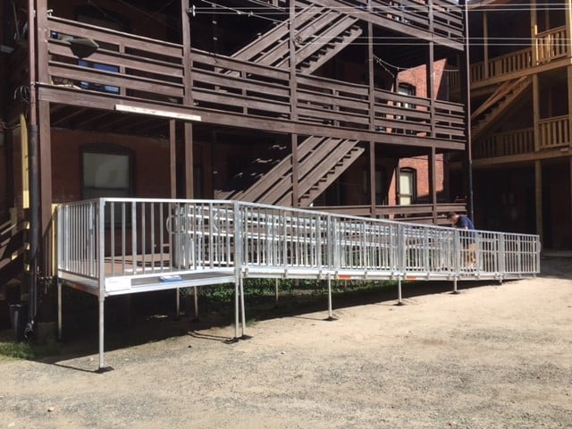 commercial-wheelchair-ramp-installed-outside-of-factory-in-Massachusetts