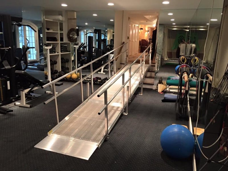 Solid surface portable ramp to access home gym in Hartford, Connecticut