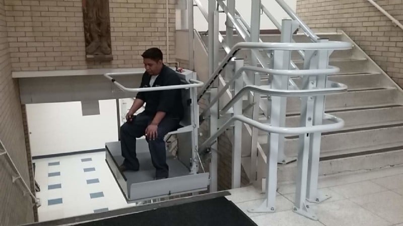 Man-riding-inclined-platform-lift-installed-by-Lifeway-Chicagoland.jpg