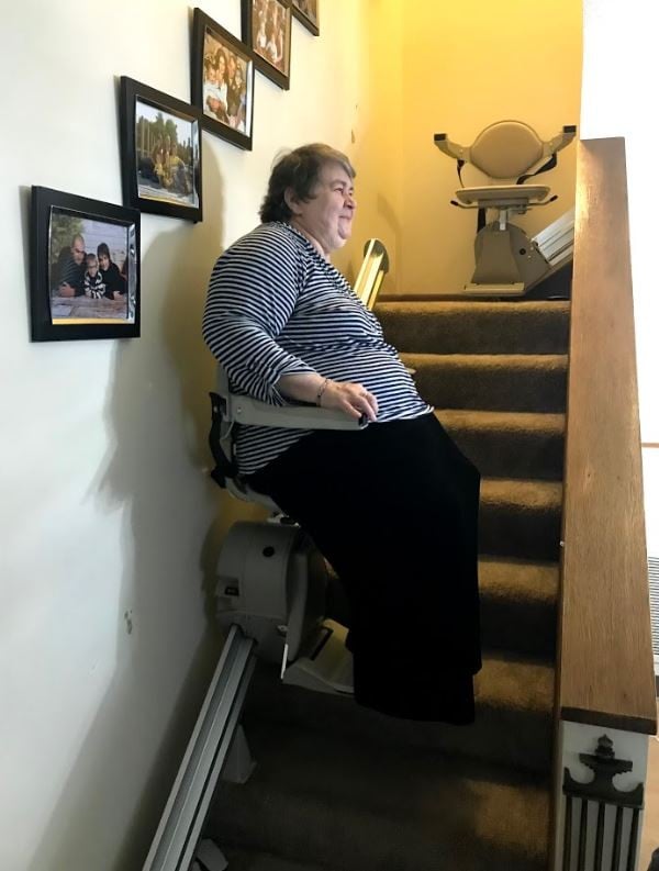 Minnesota resident enjoys her first ride on her Bruno Elan stairlift