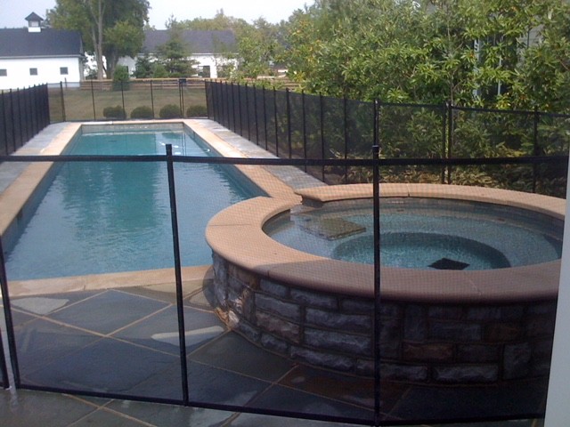 Protect A Child mesh pool fence around thin pool & hot tub
