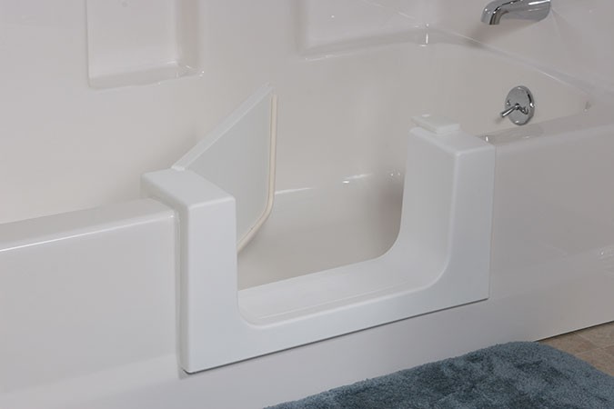 Tub cut-out with watertight door in Massachusetts