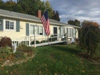 aluminum modular residential wheelchair ramp in front of home