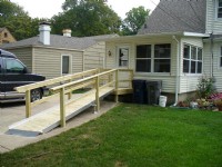 Wooden wheelchair ramp installed at a local home