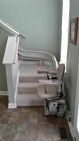 Bruno Elite curved stair lift installed in a local home