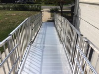 EZ-Access-aluminum-modular-ramp-with-solid-surface-and-handrails