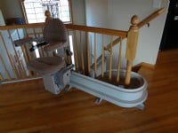 Bruno Elite curved stairlift with extended rail overrun