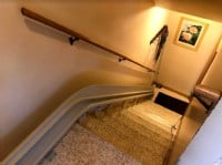 Bruno-curved-rail-mounted-on-staircase-in-home-in-Minnesota.JPG