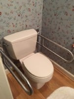 Toilet Grab Bars-folded-down-in-residential-bathroom-in-Indianpolis