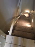 Handicare-Freecurve-stairlift-rail-mounted-to-stairs-in-Indiana-home.jpg