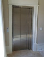 Home-Elevator-in-Lake-Forest-with-Savria-auto-slim-sliding-doors