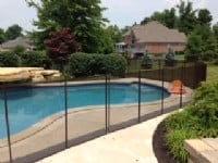Protect A Child mesh pool fence built around residential pool in Carmel, Indiana