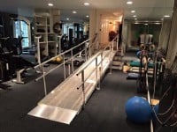 Solid surface portable ramp to access home gym in Hartford, Connecticut