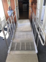 Solid surface portable ramp used at entry