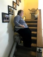 Minnesota resident enjoys her first ride on her Bruno Elan stairlift