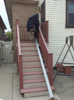 Outdoor-Bruno-Stair-Lift-with-cover-in-Elmwood-Park.PNG